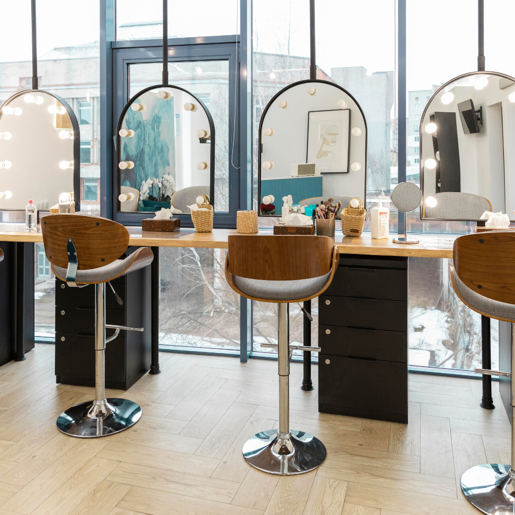 Salon interior design Karachi by Skill Studio 27 showcasing modern styling stations and elegant decor