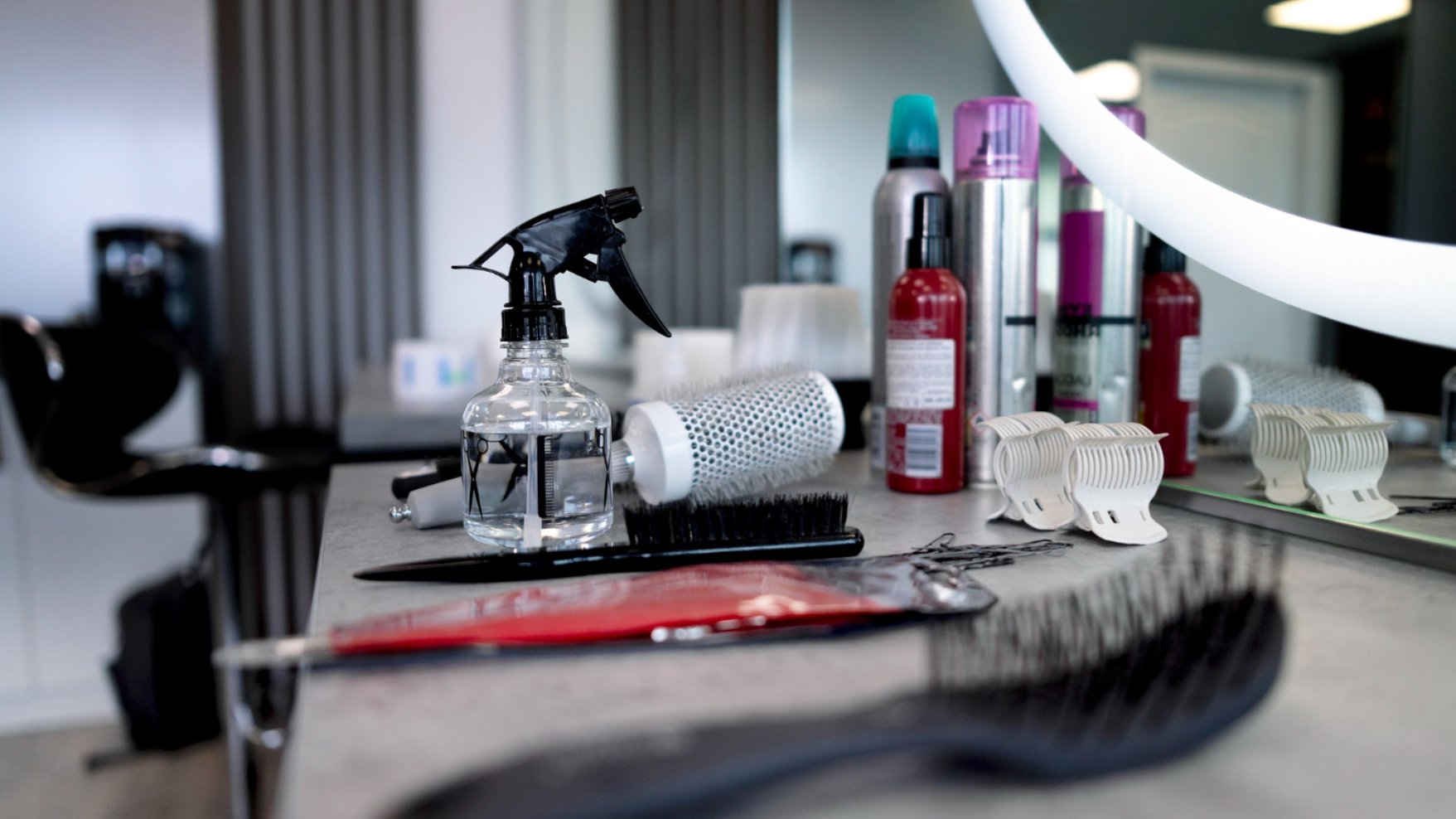 Salon interior design Karachi by Skill Studio 27 showcasing modern styling stations and elegant decor