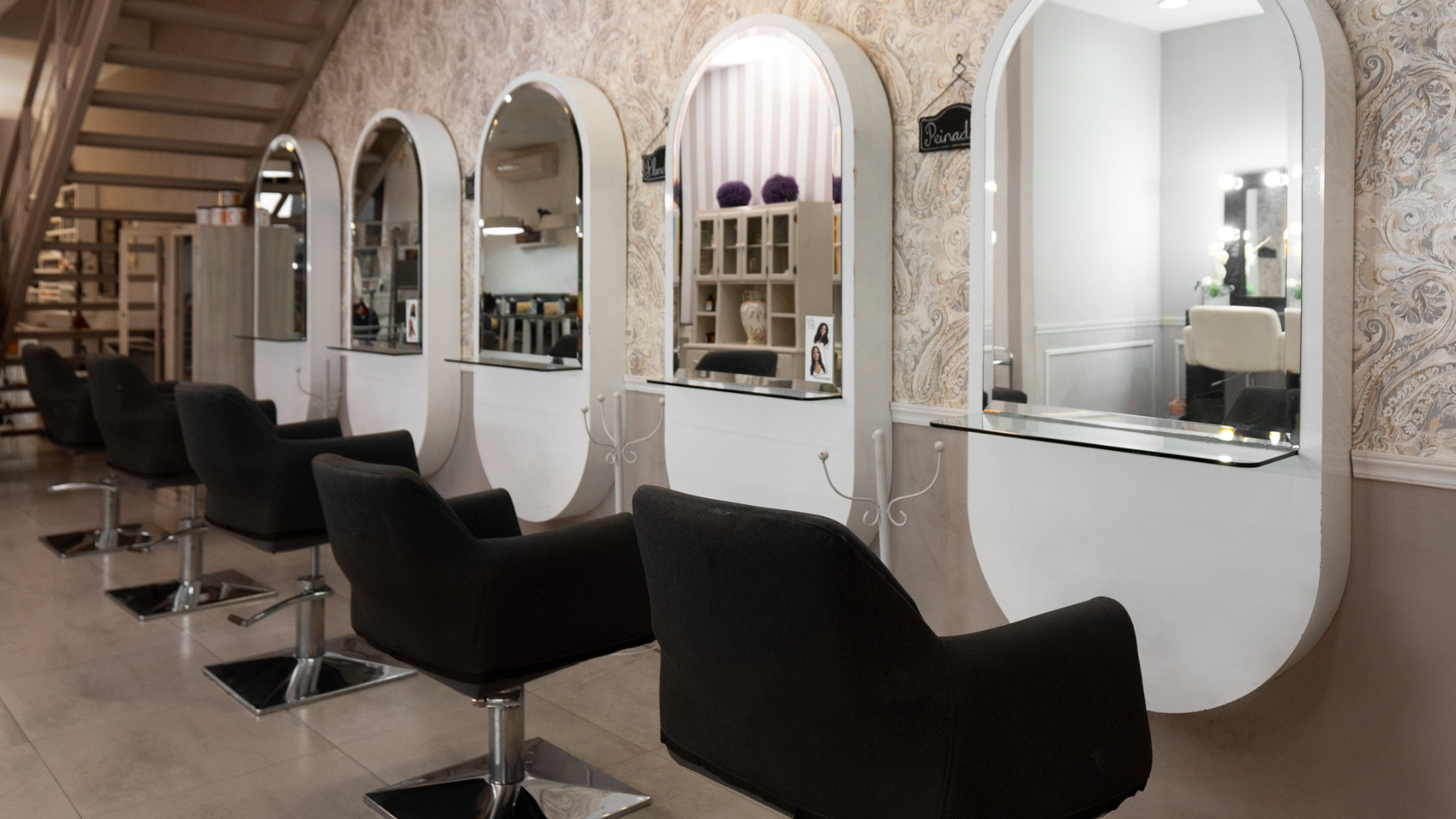 Salon interior design Karachi by Skill Studio 27 showcasing modern styling stations and elegant decor